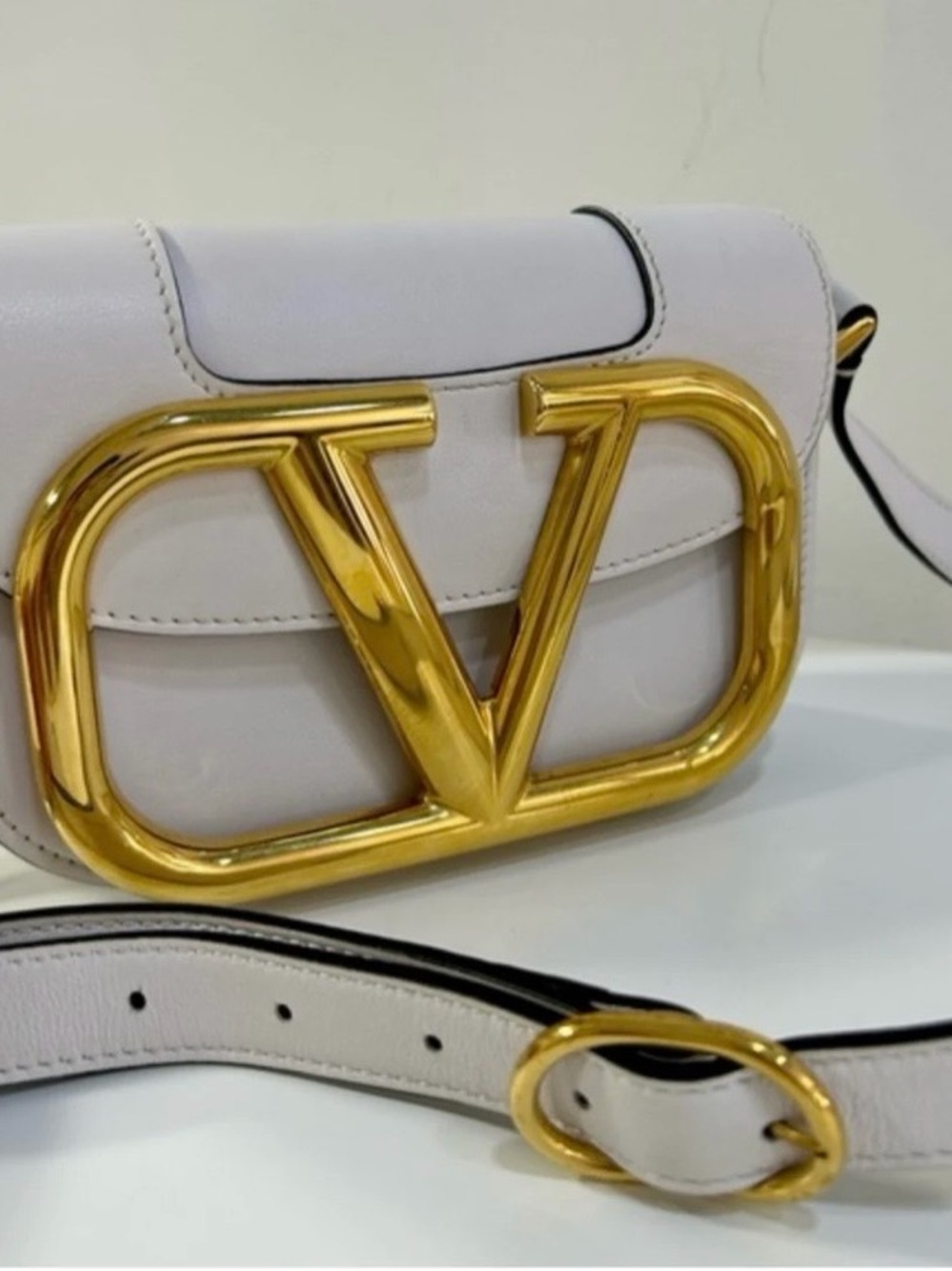 Valentino Garavani Small VLogo Crossbody in Light Gray with Gold Hardware
